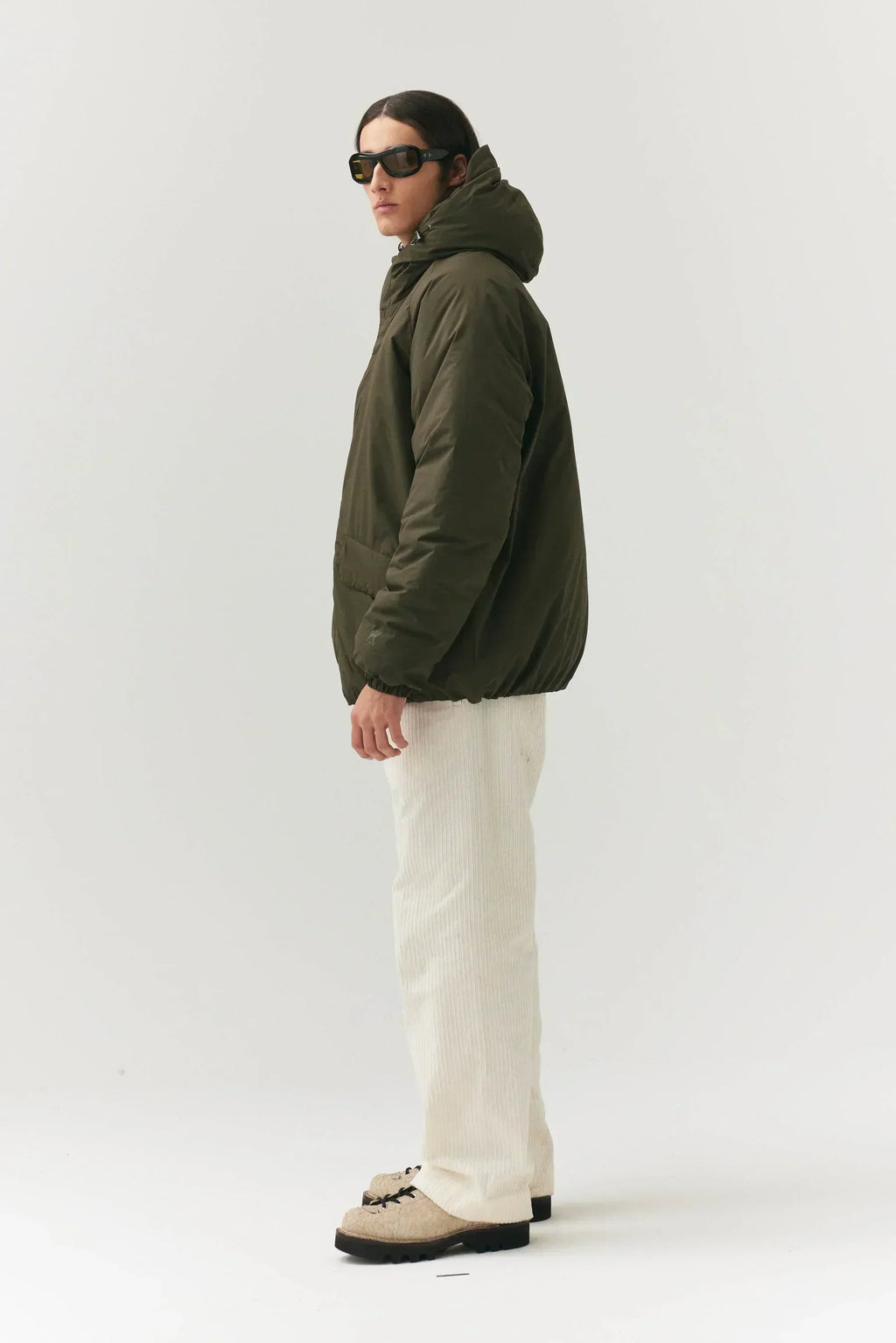 Prestige Market K-SEA New Army Jacket featuring a rugged military style with detailed stitching and durable fabric.