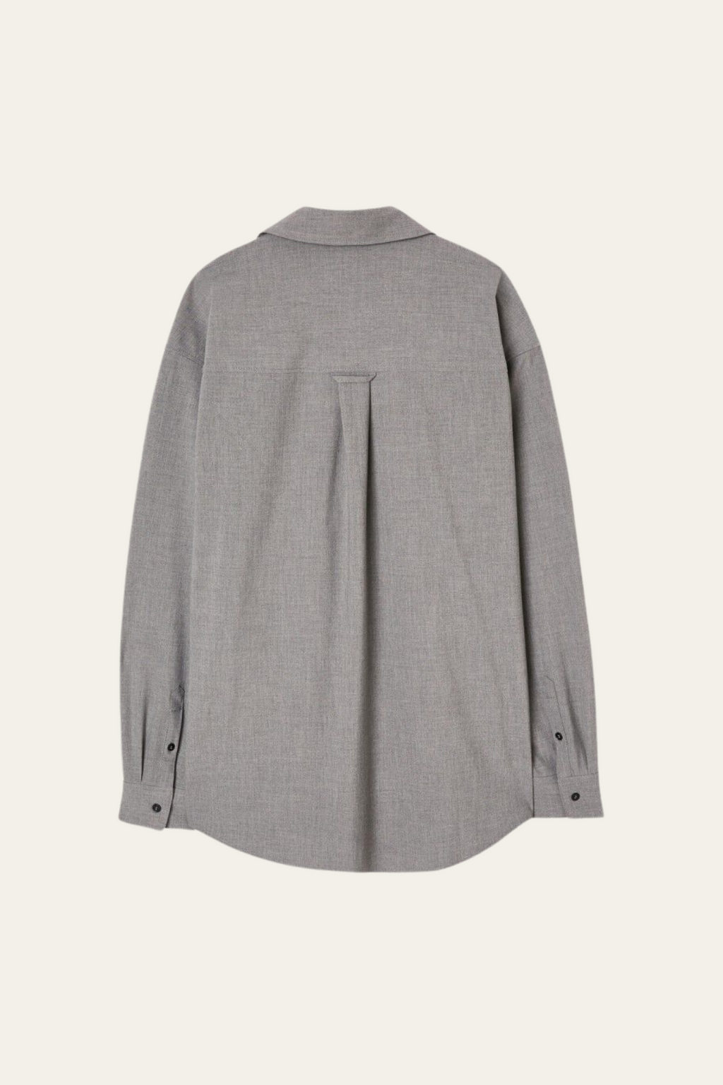 Grey KABIRD shirt by Prestige Market displayed on a hanger, showing the shirt's fabric and collar details.