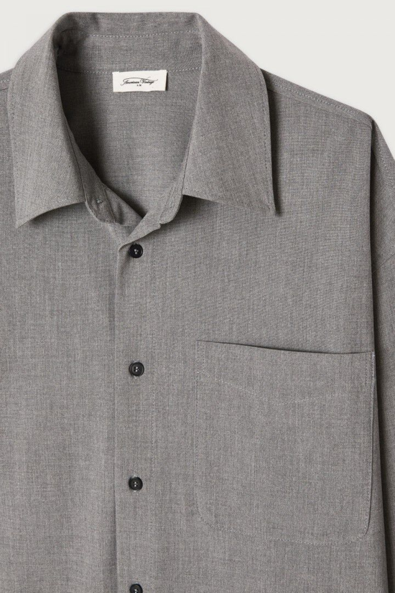 Grey KABIRD shirt by Prestige Market, showing front view with collar and button details on a plain background.